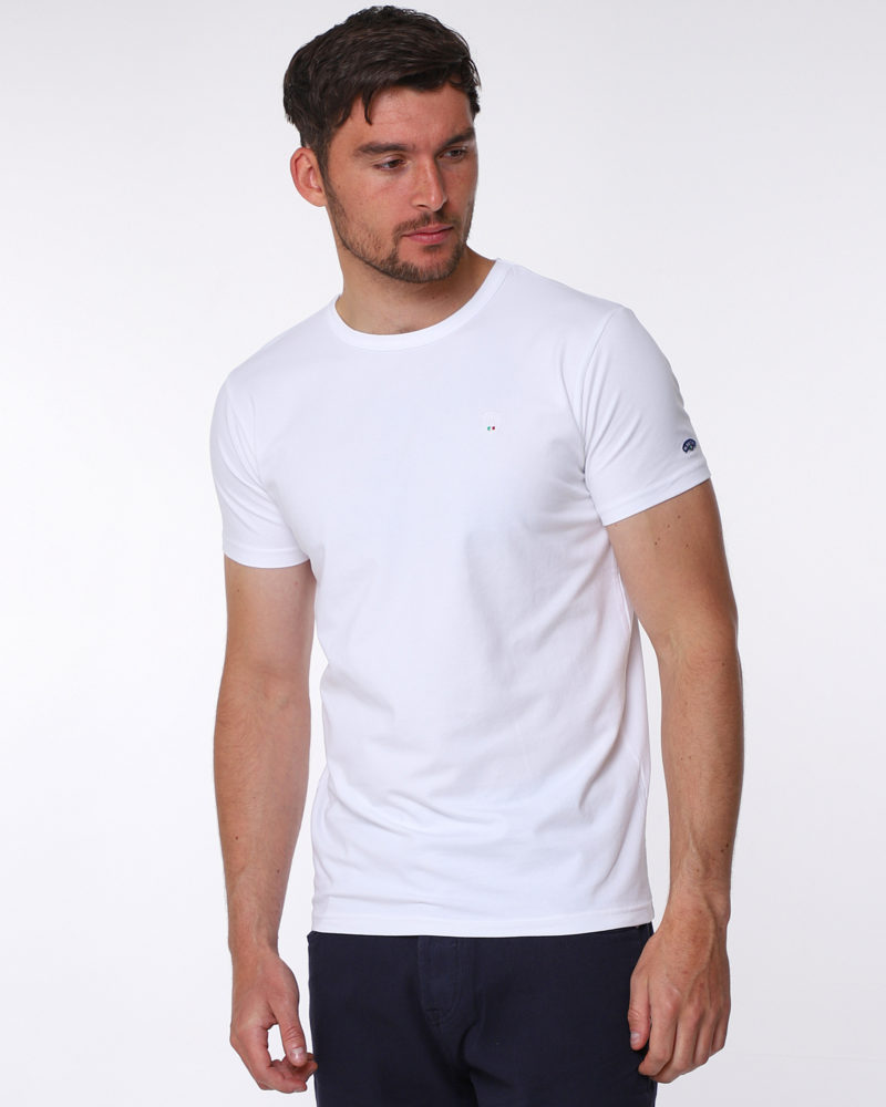 White cotton round neck t shirt, with small shield MANCINI logo on the chest and a small logo on the left arm.